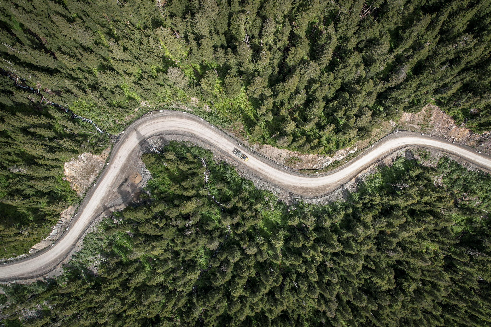 Mining exploration site with workers